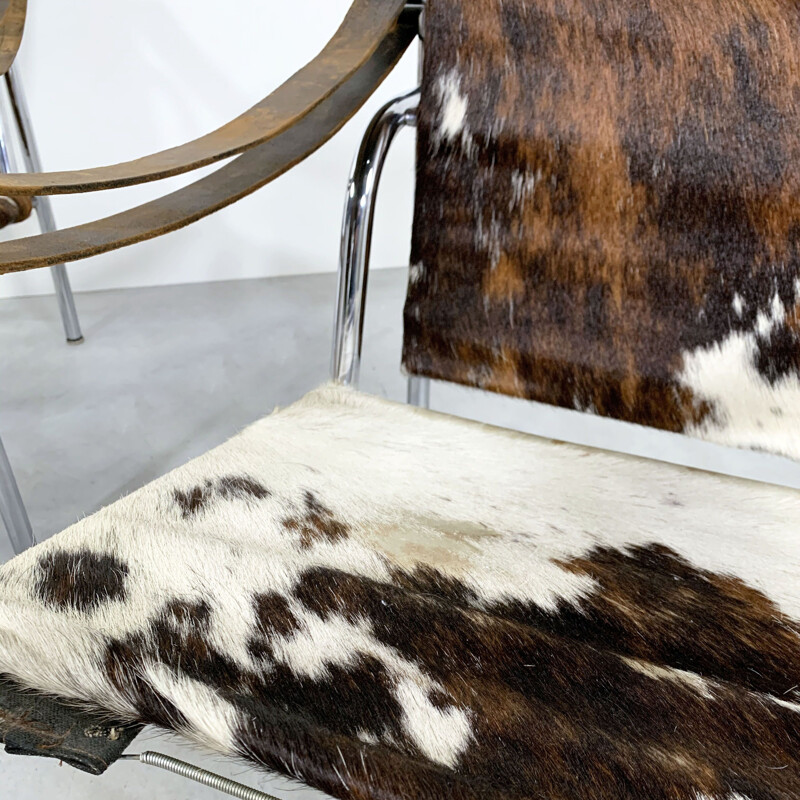 Pair of vintage Cow Hide Armchairs by Le Corbusier for Cassina 1970s