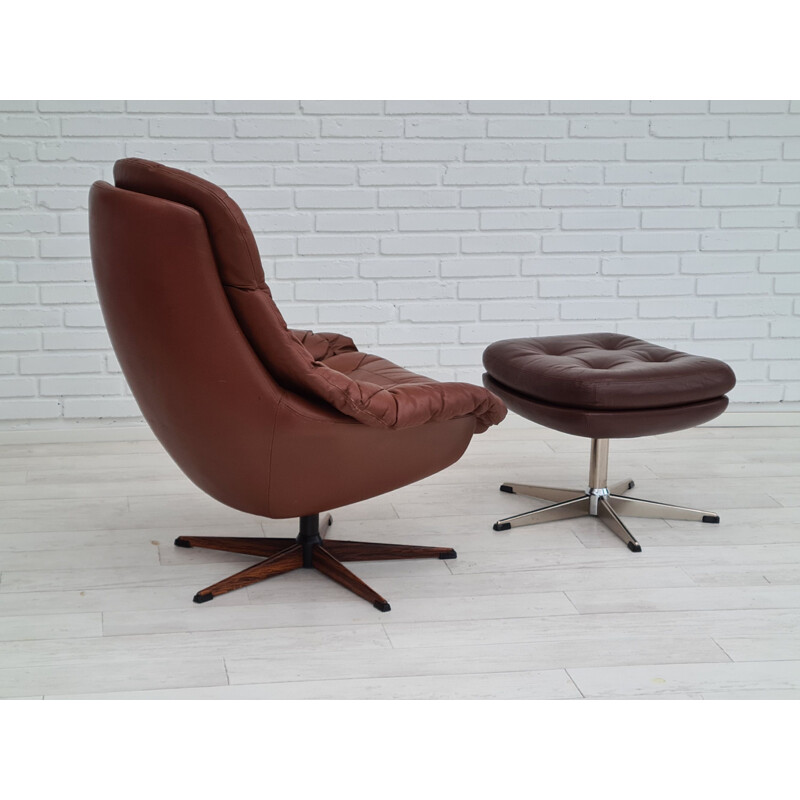 Vintage swivel armchair with stool leather Denmark 1970s