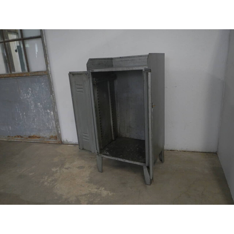 Vintage metal workshop cabinet with two patinated doors, 1970