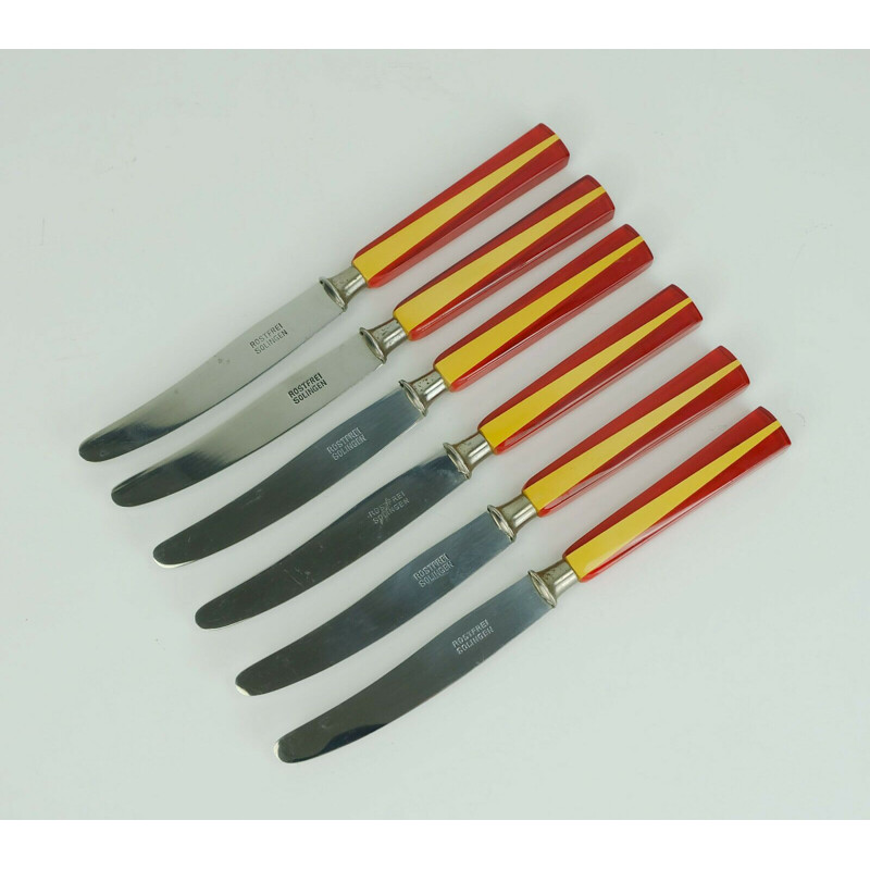 Set of 6 vintage solingen knives in bakelite and lucite on a support 1930s