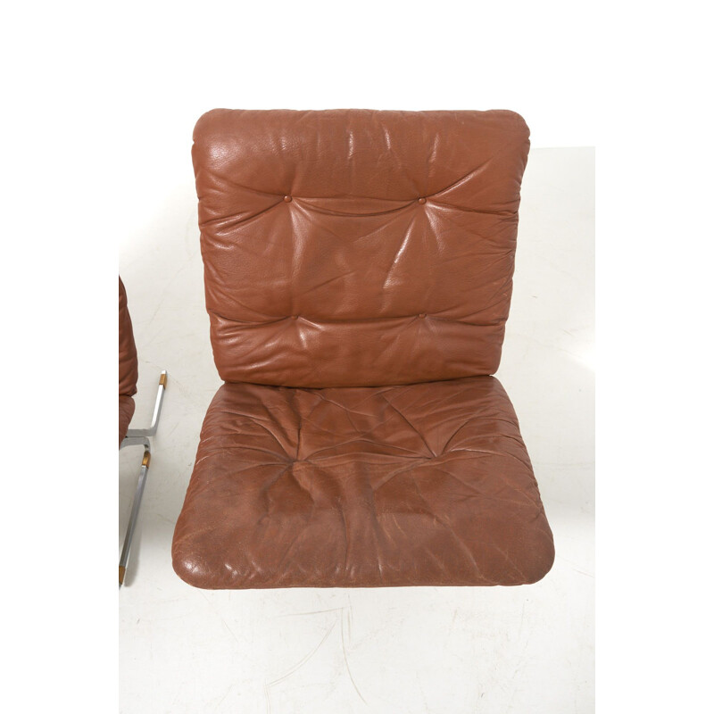 Paire de fauteuils vintage en cuir 1960