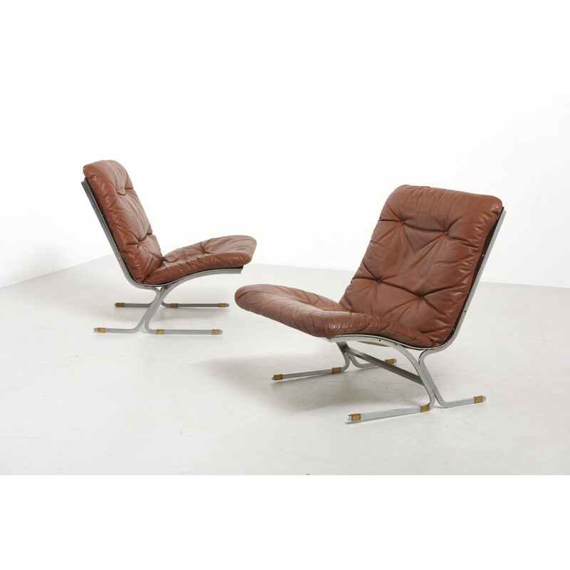 Paire de fauteuils vintage en cuir 1960