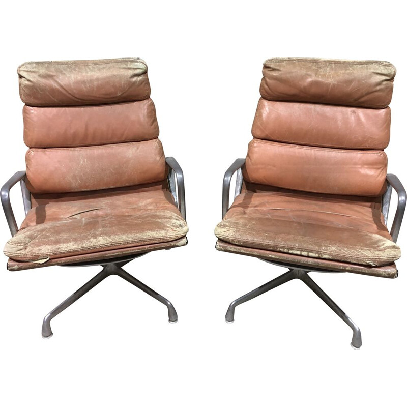 Pair of vintage armchairs by Charles and Ray Eames in leather and aluminium 1960s