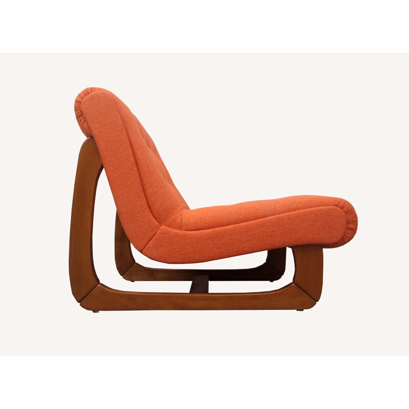 Lounge chair in solid wood and orange fabric - 1970s