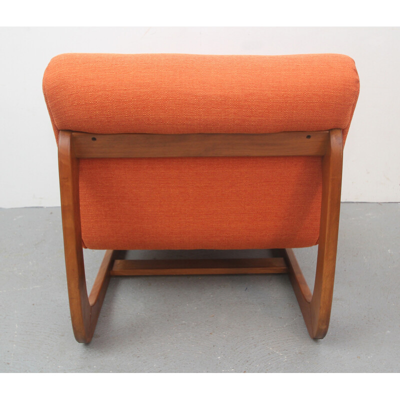 Lounge chair in solid wood and orange fabric - 1970s