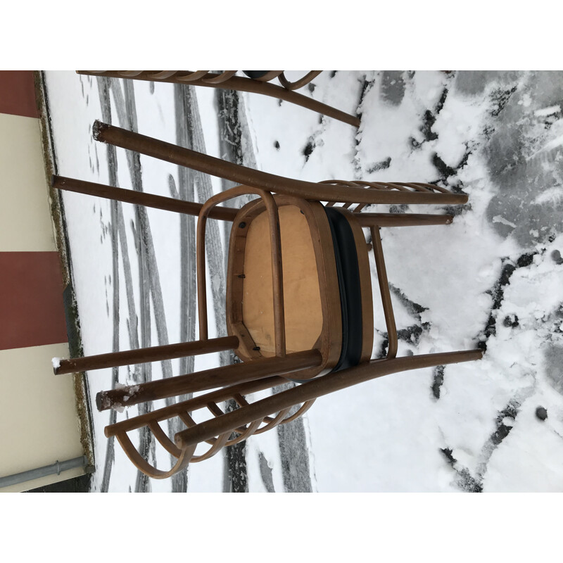 Lot de 4 chaises vintage à barreaux bois et Skaï 1960