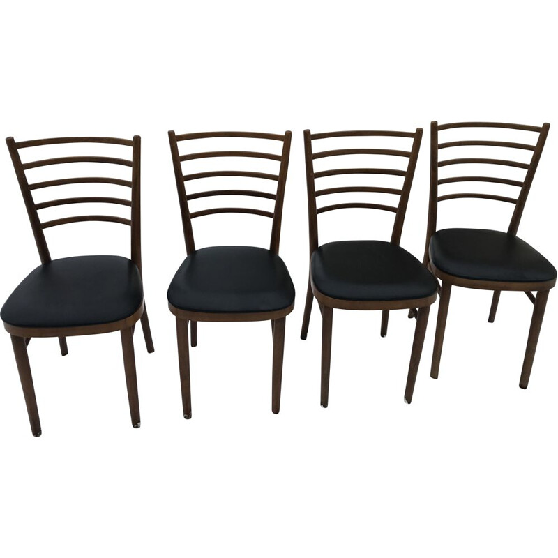 Set of 4 vintage chairs with wooden bars and skai 1960s