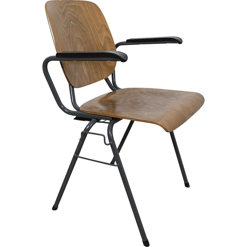 Vintage Stackable industrial chair with armrests by Kho Liang Ie