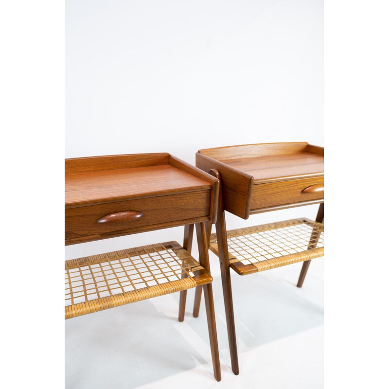 Pair of vintage side tables in teak with paper cord shelf Denmark 1960s