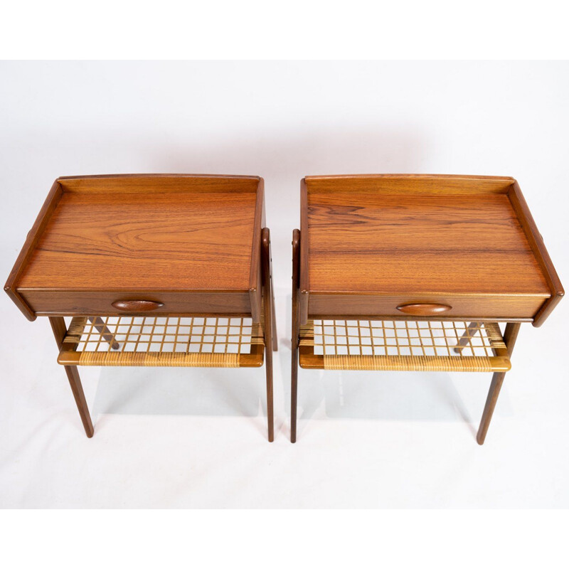 Pair of vintage side tables in teak with paper cord shelf Denmark 1960s