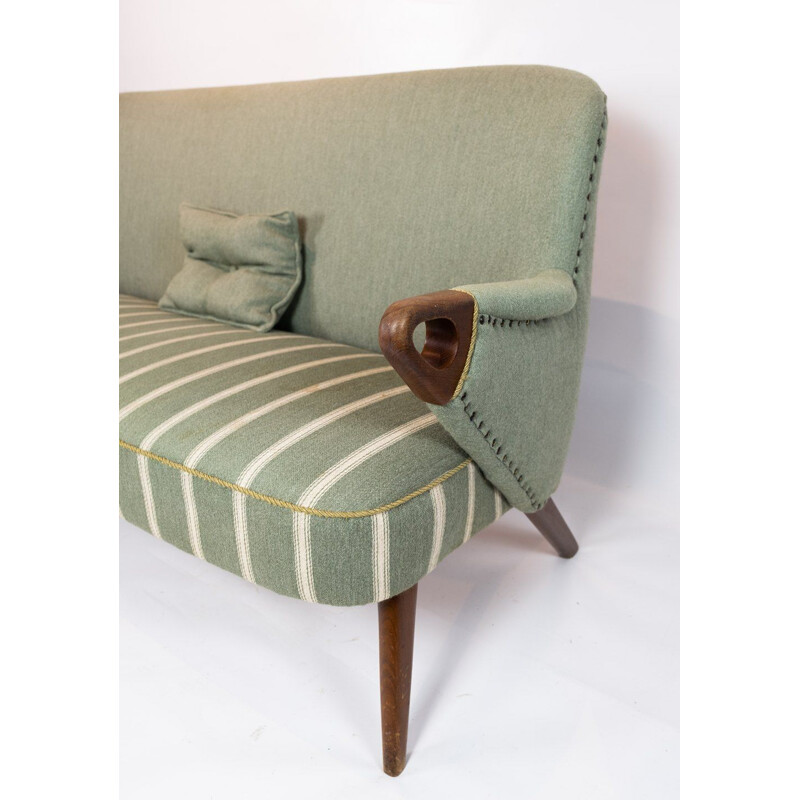 Vintage seater sofa with light green striped fabric and teak legs and arms Denmark 1960s