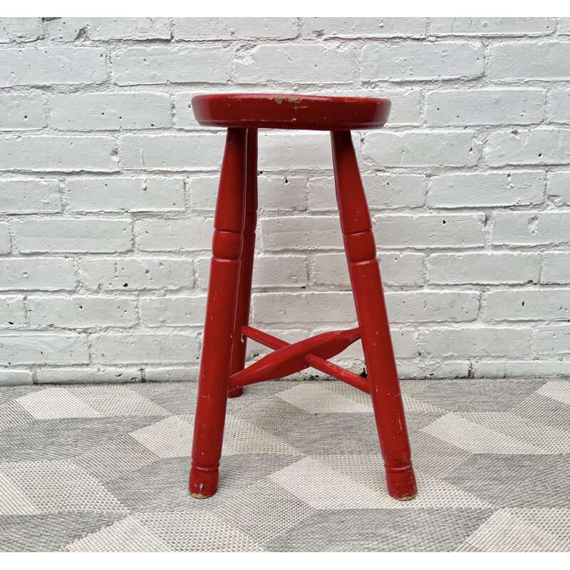 Vintage red wooden stool