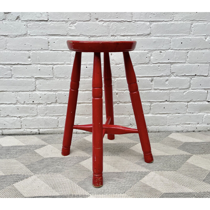 Vintage red wooden stool
