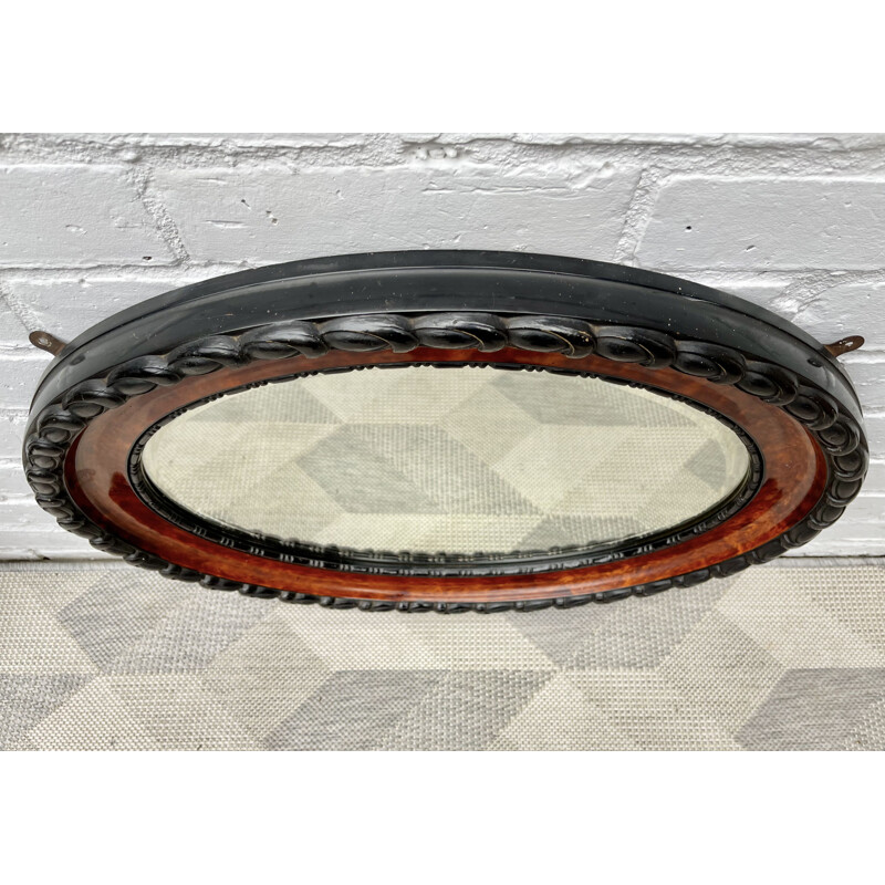 Vintage oval wall mirror with bevelled edge