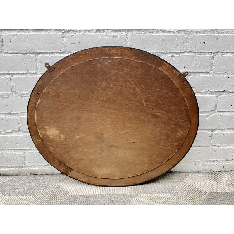 Vintage oval wall mirror with bevelled edge