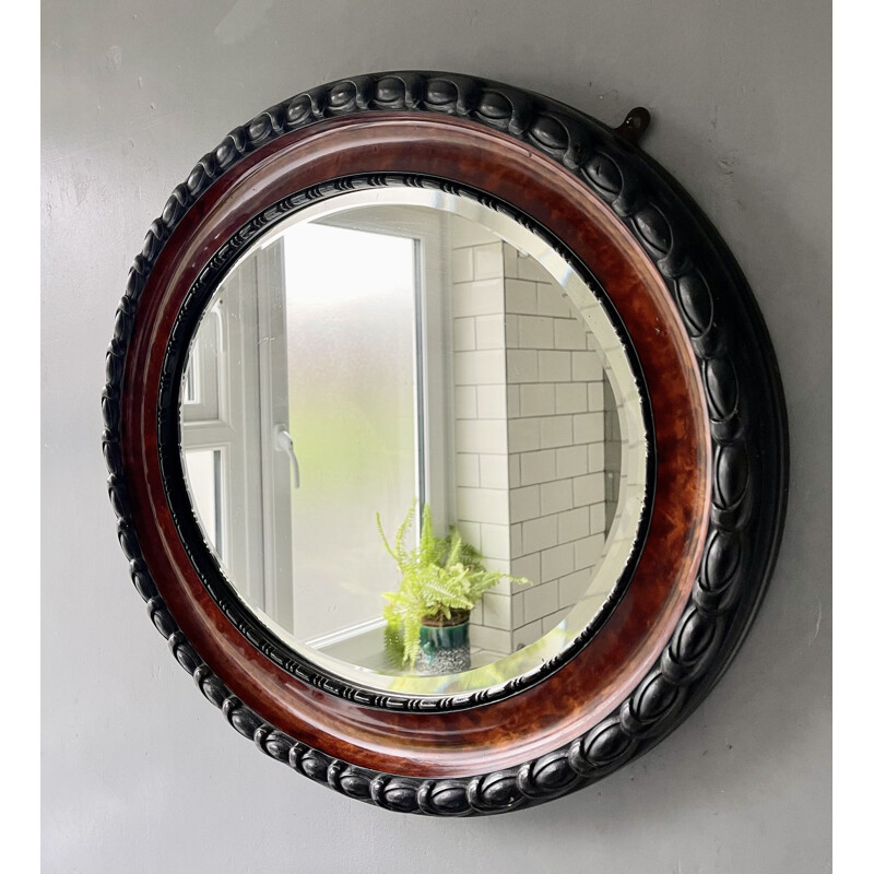 Vintage oval wall mirror with bevelled edge