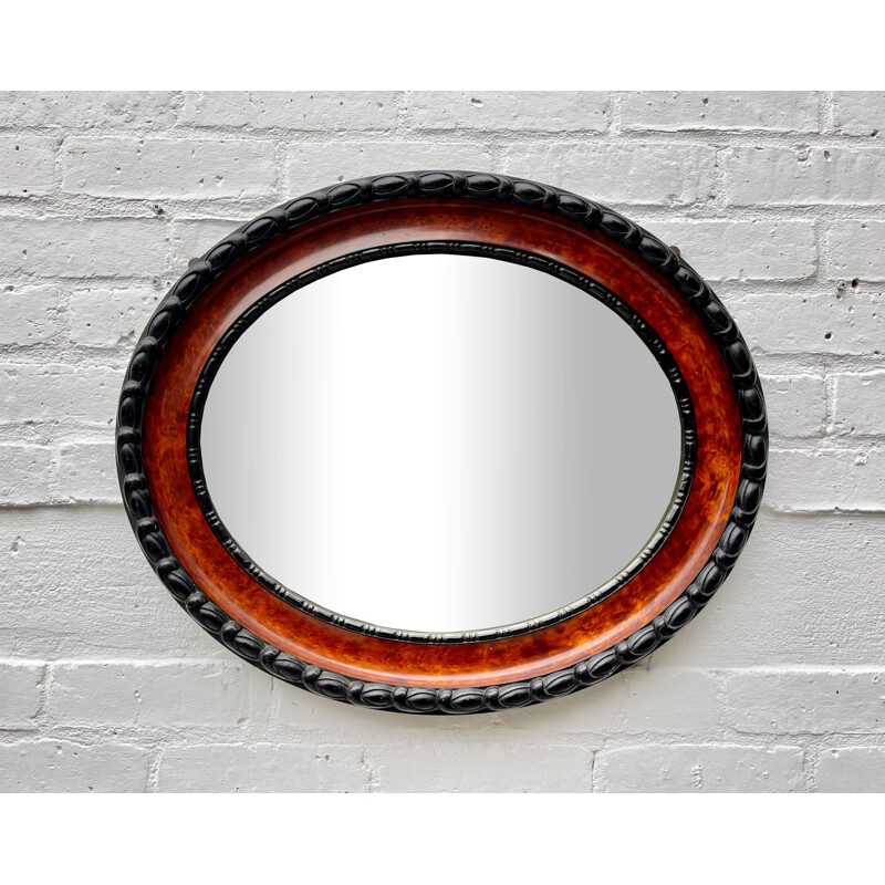 Vintage oval wall mirror with bevelled edge