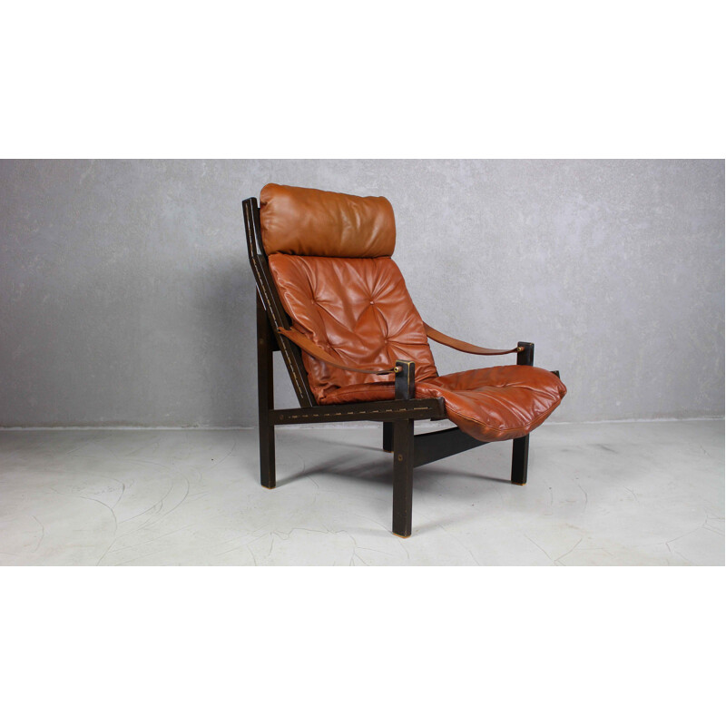 Vintage brown leather lounge chair by Torbjørn Afdal for Bruksbo 1960