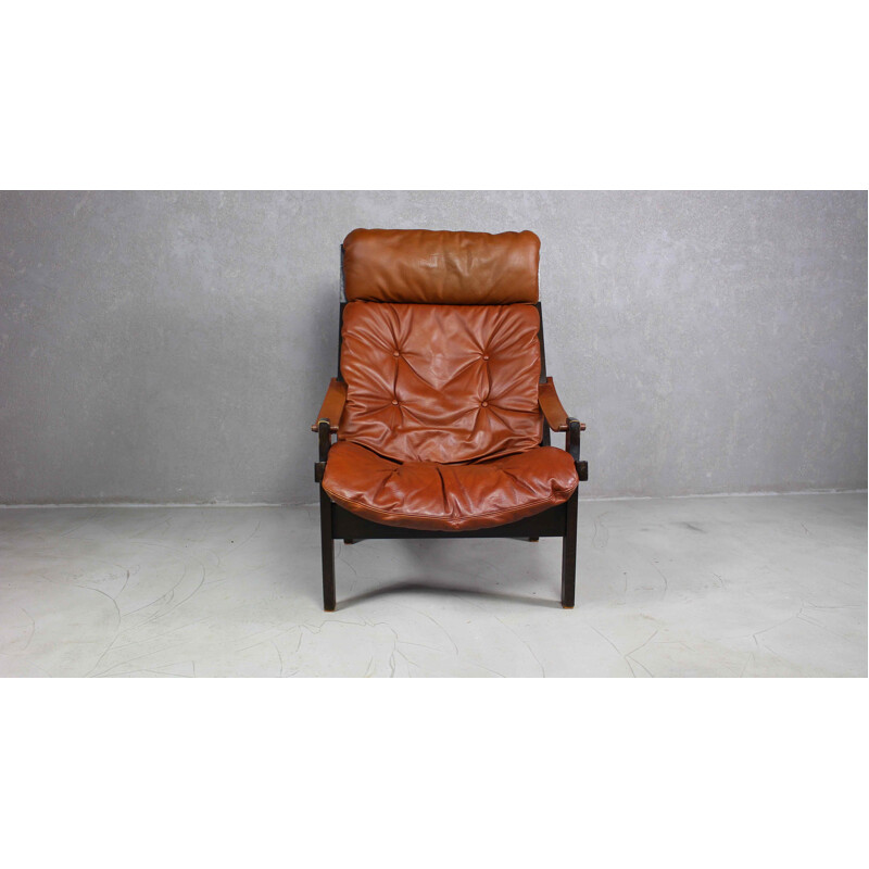 Vintage brown leather lounge chair by Torbjørn Afdal for Bruksbo 1960