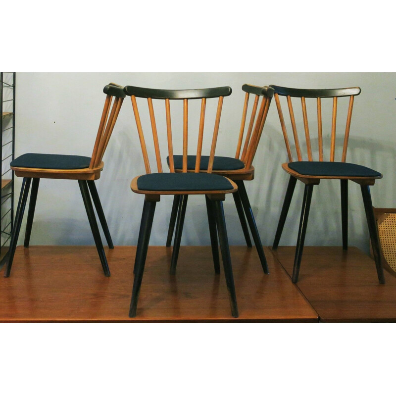 Set of 12 vintage chairs with splayed legs plywood seats and petrol blue-green covers 1950s