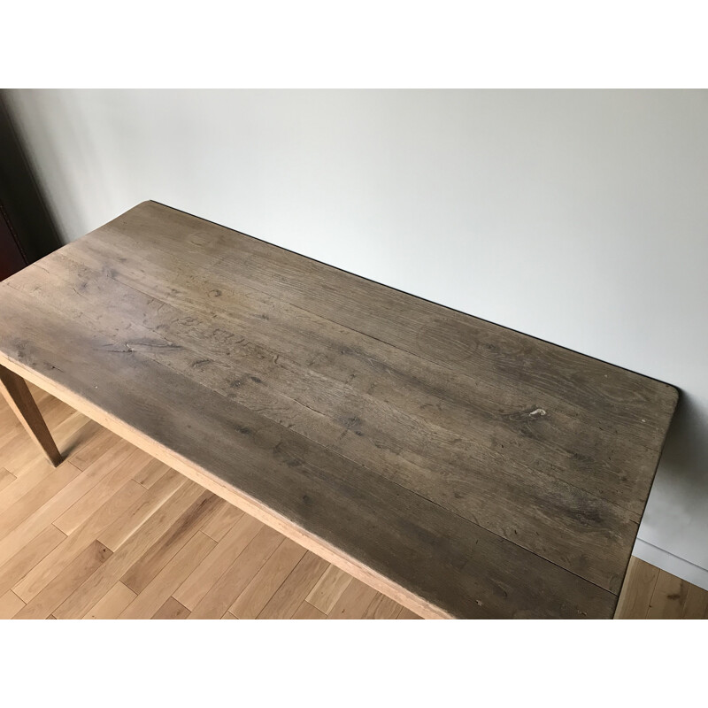 Vintage table with sleek lines and elegant oak legs