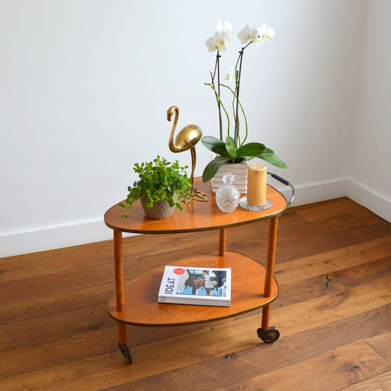 Vintage side table on casters 1950s