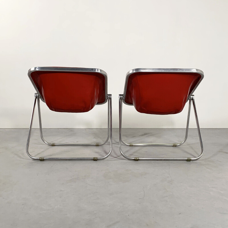 Paire de chaises vintage Plona en cuir rouge de Giancarlo Piretti pour les Castelli 1970