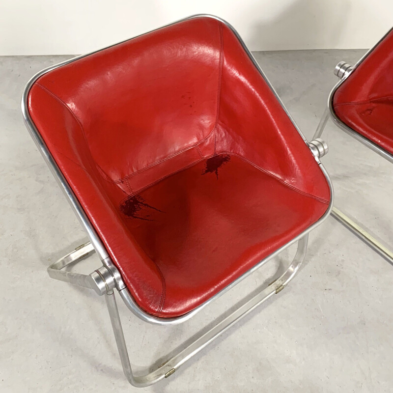 Paire de chaises vintage Plona en cuir rouge de Giancarlo Piretti pour les Castelli 1970