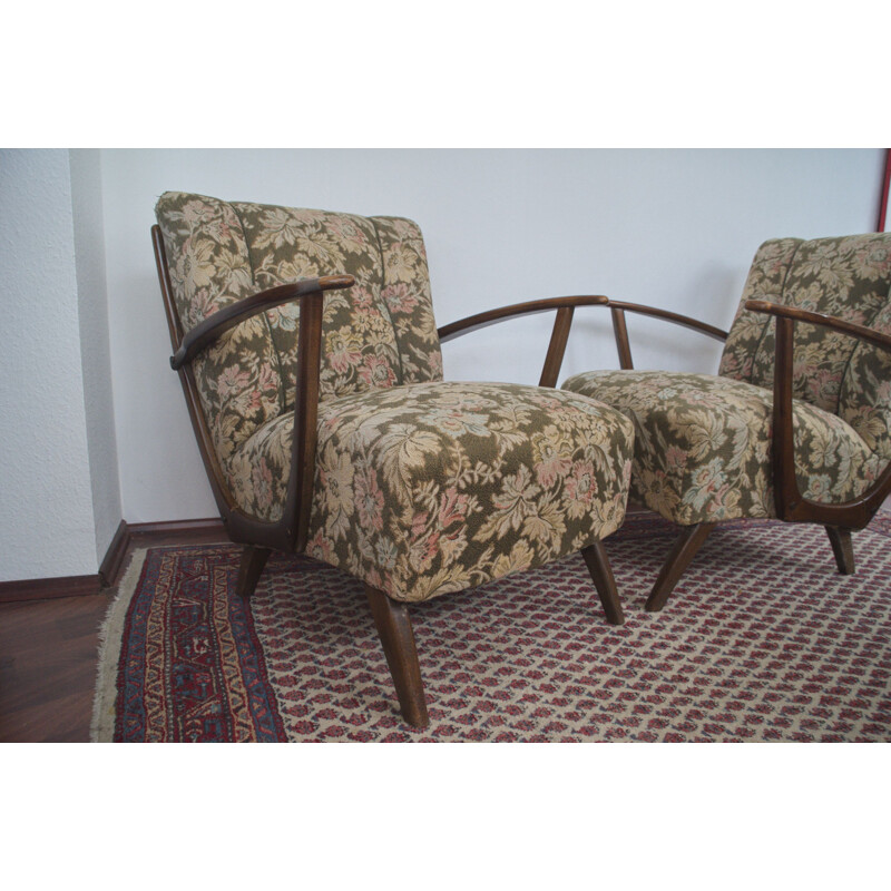 Pair of vintage Art Deco Armchairs with original Cover and wooden Armrests 1930s