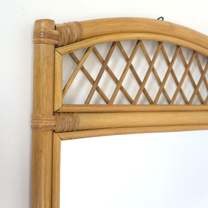 Vintage mirror and its rattan shelf 1970s