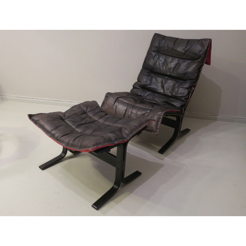 Vintage Siesta Chair and Ottoman Black Leather with Red Backing by Ingmar Relling 