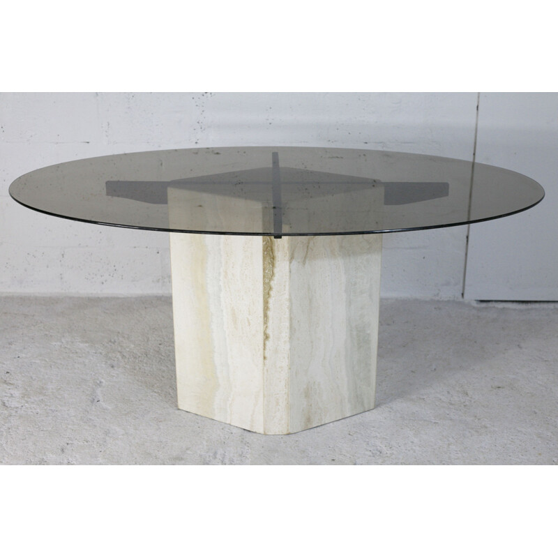 Mesa de salón vintage con base de piedra y tapa elíptica de cristal ahumado Italia 1970