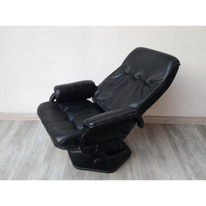 Vintage leather reclining armchair by Unico