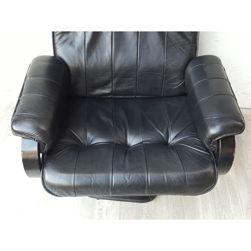 Vintage leather reclining armchair by Unico