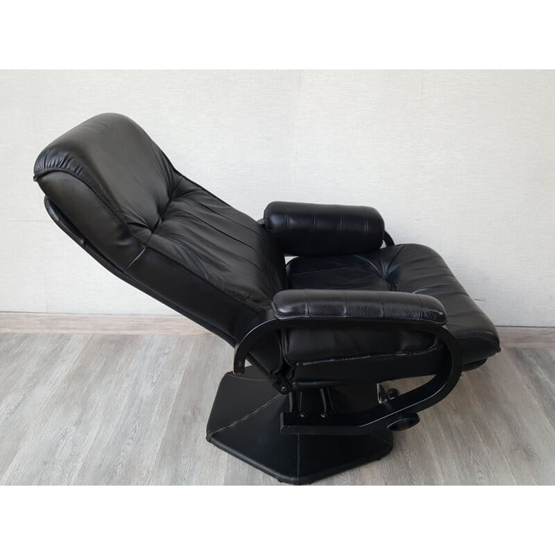 Vintage leather reclining armchair by Unico