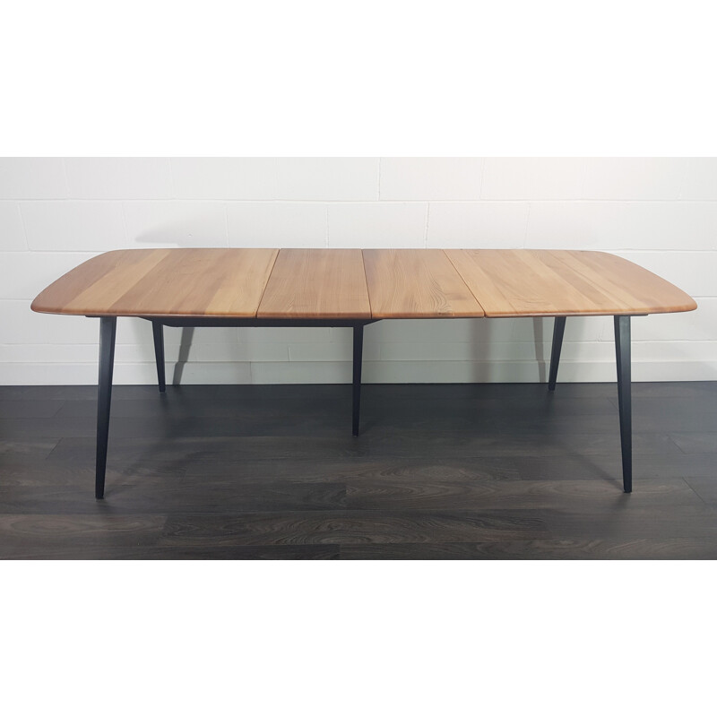 Vintage extensible table with black legs Ercol Grand 1960