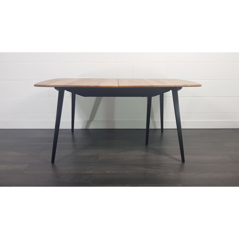 Vintage extensible table with black legs Ercol Grand 1960