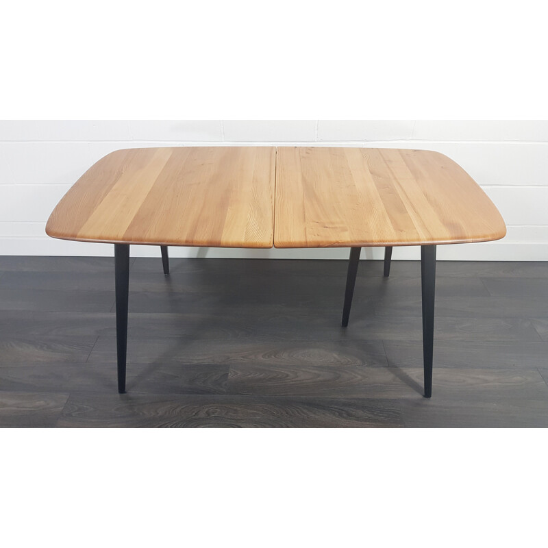 Vintage extensible table with black legs Ercol Grand 1960