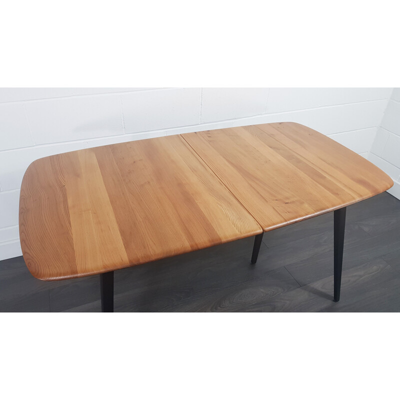 Vintage extensible table with black legs Ercol Grand 1960