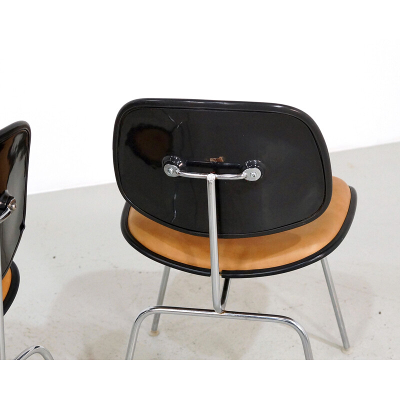 Pair of vintage Eames DCM chairs in leather Herman Miller Edition