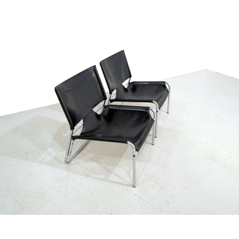 Paire de fauteuils vintage en cuir noir et chrome 70