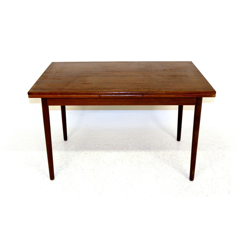 Vintage retractable teak dining table