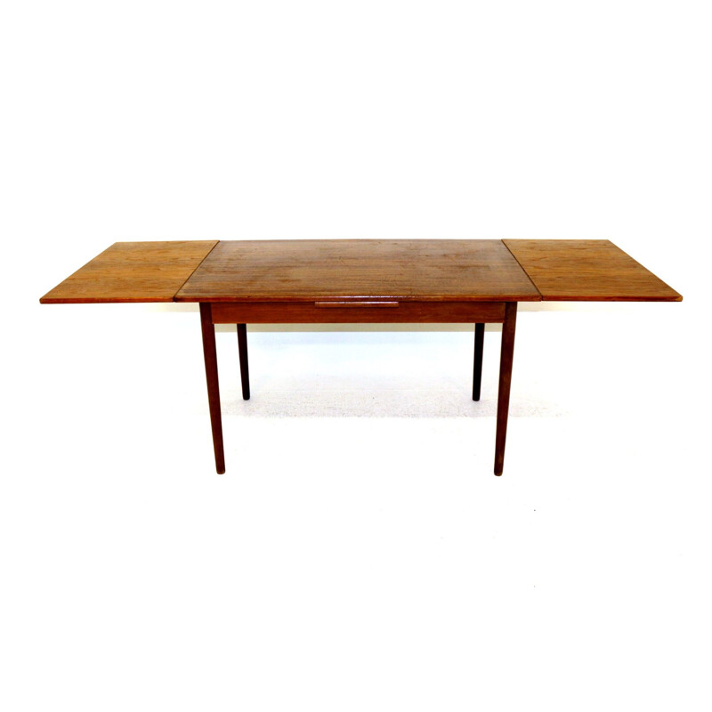 Vintage retractable teak dining table