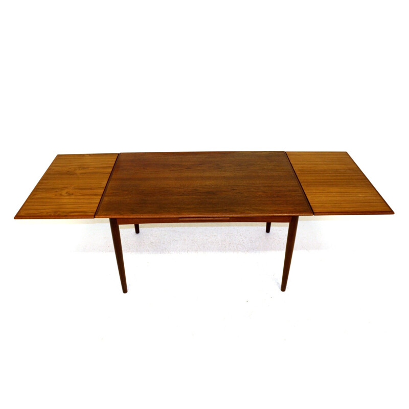 Vintage retractable teak dining table