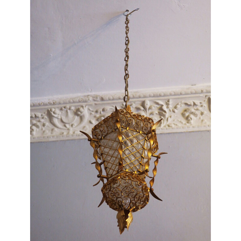 Vintage lantern in gold metal