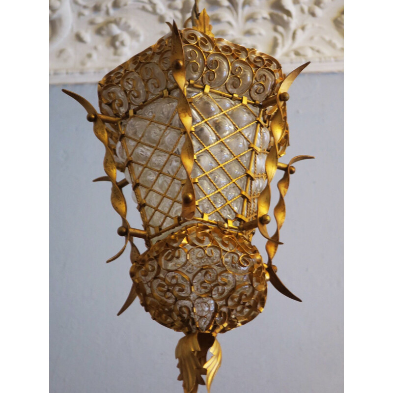 Vintage lantern in gold metal