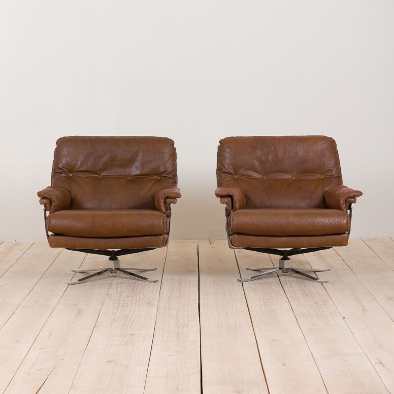 Pair of vintage brown buffalo leather swivel lounge chairs by Aalborg Polstermøbelfabrik Denmark 1970s