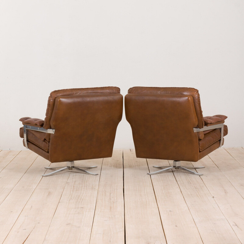 Pair of vintage brown buffalo leather swivel lounge chairs by Aalborg Polstermøbelfabrik Denmark 1970s