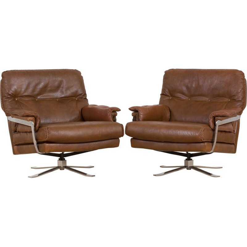 Pair of vintage brown buffalo leather swivel lounge chairs by Aalborg Polstermøbelfabrik Denmark 1970s