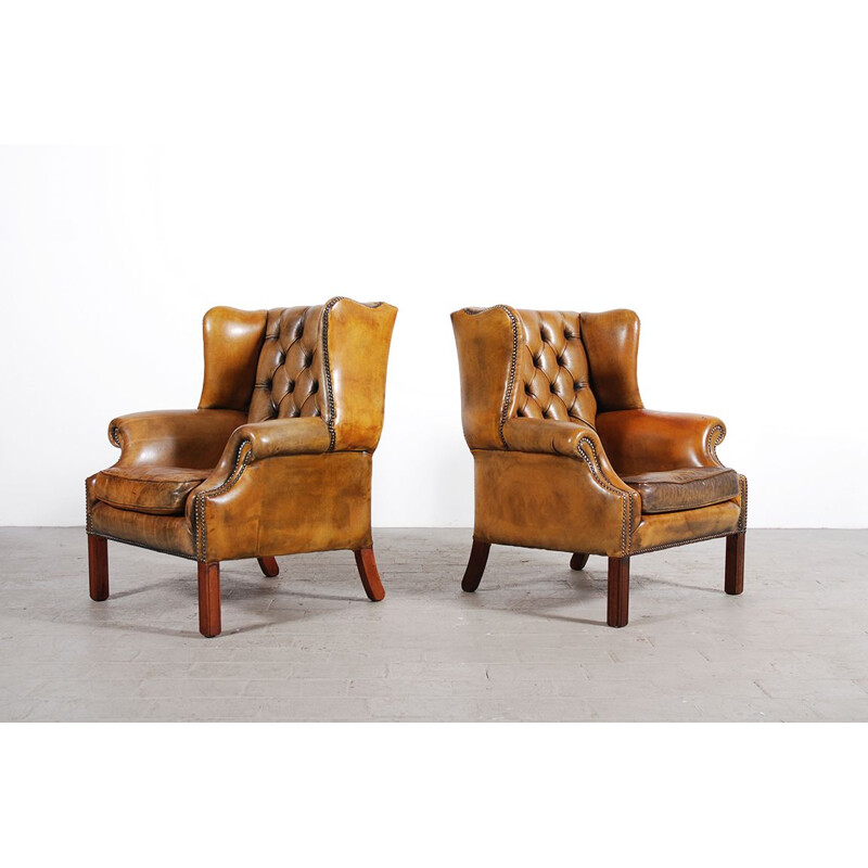 Pair of vintage armchairs with leather ears 1950s